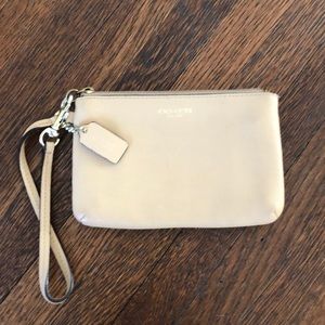 Coach wristlet, light tan.